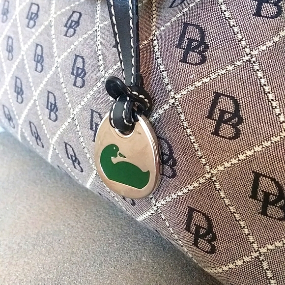 Dooney & Bourke DB Triangle Quilt Pattern Canvas & Leather Small Baguette. - Picture 6 of 11